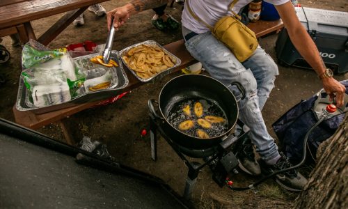 Outside Randall’s Island Tent Shelters, Immigrants Cook to Sell or Share