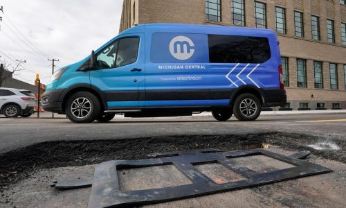 New technology installed beneath Detroit street can charge electric vehicles as they drive