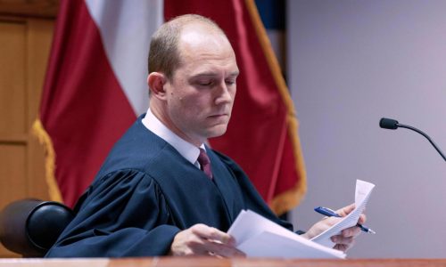 The judge in Trump’s Georgia election case limits the disclosure of evidence after videos’ release