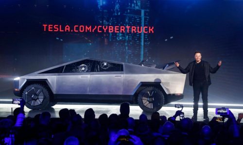 Tesla delivers about a dozen stainless steel Cybertruck pickups as it tries to fix production woes