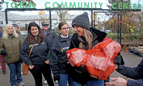 Gallery:  Hundred’s of turkey’s donated to Mission Hill families