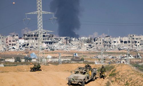 Palestinians stream into a southern Gaza town as Israel expands its offensive in the center
