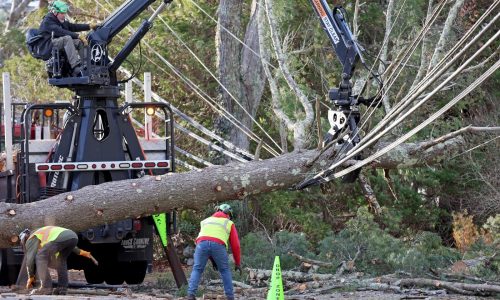 Storm aftermath in Massachusetts: Tens of thousands still without power, crews work ‘nonstop’ before the holiday weekend