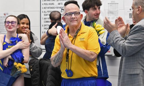 East Boston swim coach Dave Arinella waves goodbye after 48 memorable years