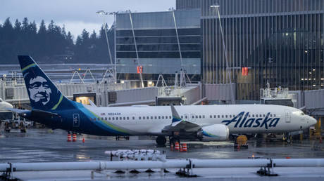 Boeing stock down as MAX fleet grounded