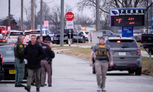 Police say there has been a shooting at a high school in Perry, Iowa; extent of injuries unclear