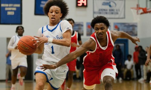 Energized by sellout crowd, Burke nips Charlestown, 68-65