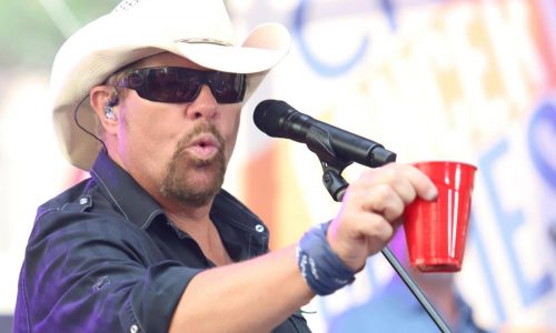 Fans raise a red Solo cup to honor Toby Keith, who immortalized the humble cup in song