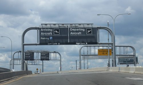 Two planes clip wings on deicing pad at Logan