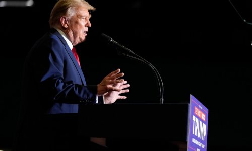 Trump escalates his immigration rhetoric with baseless claim about Biden trying to overthrow the US