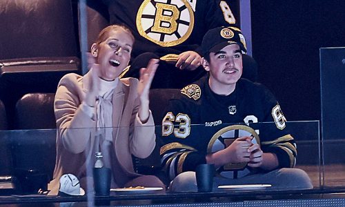 Celine Dion adds star power to Bruins game