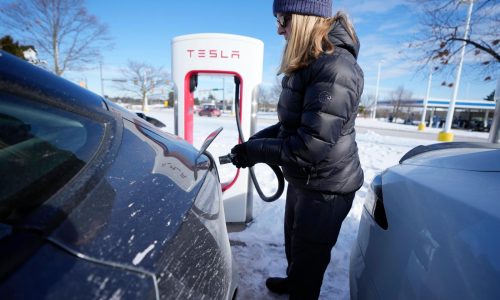 Governor signs bills creating electric vehicle charging station network across Wisconsin