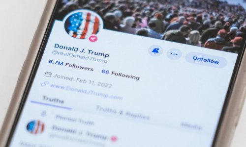 Trump’s social media company soars nearly 50% in its first day of trading on Nasdaq