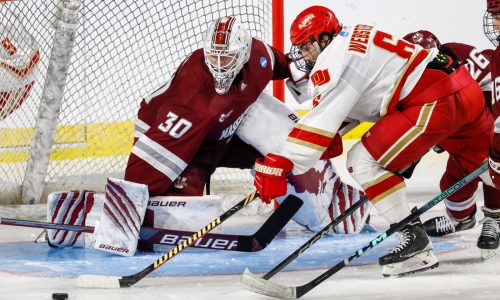 NCAA hockey: Boston University skates past RIT; UMass falls in double-overtime thriller