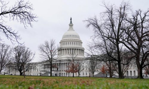 Biden signs a package of spending bills passed by Congress just hours before a shutdown deadline