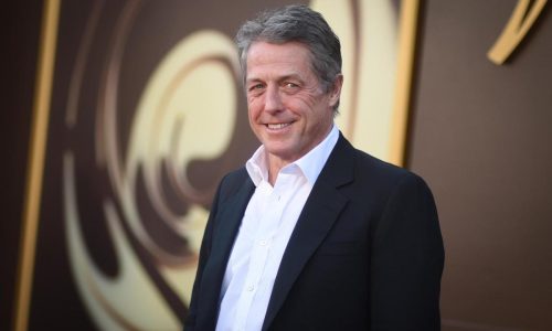 Hugh Grant says he got ‘enormous sum’ to settle suit alleging illegal snooping by The Sun tabloid