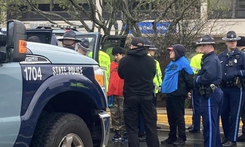 Massachusetts State Police arrest 20 climate activists for disrupting traffic at Hanscom Field