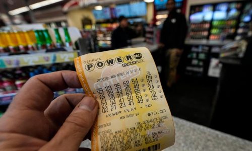 Powerball jackpot reaches $1.23B as long odds mean lots of losing, just as designed