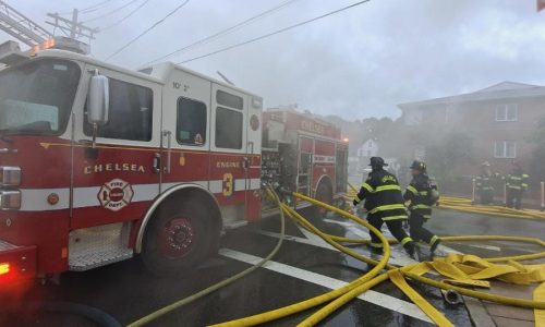 Firefighters battle five-alarm fire in Chelsea building