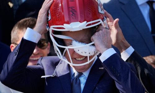 Biden breaks no-helmet rule