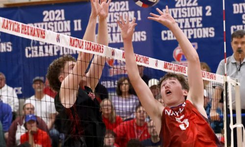 Natick volleyball takes care of business at home