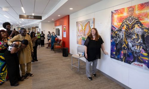 St. Paul nurse, breast cancer survivor, recognized with portrait at HCMC