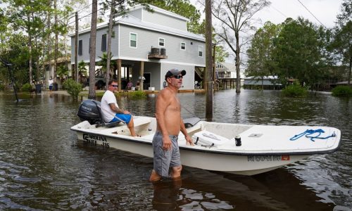 States beg insurers not to drop climate-threatened homes