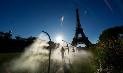 Paris Olympics brings out hoses and misters to cool down fans during heat wave