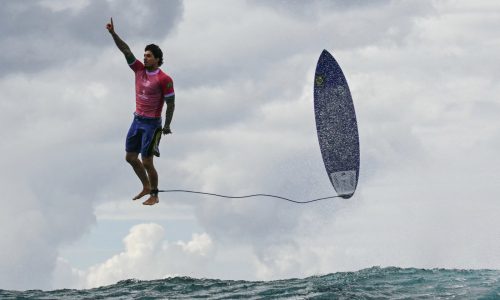 Right place, right time: The story behind the viral surfing photo from the Paris Olympics