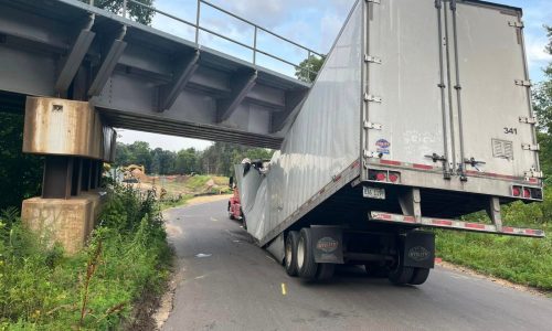 A bridge too low: Lost semi driver gets wedged beneath Cottage Grove span