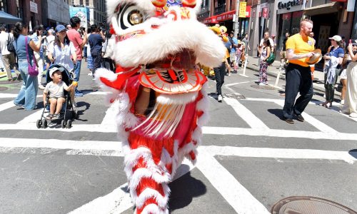 Chinatown streets alive with dancers August Moon Festival