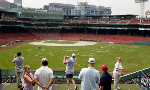 Golf comes to Fenway Park: People tee off in the ballpark during Upper Deck Golf event