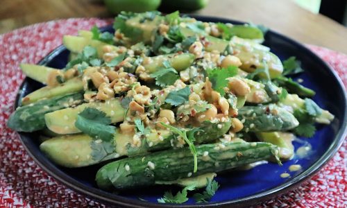 Peanut and chili crisp cucumber salad is a bright and crunchy summer dish