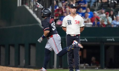 Twins hang on after Santana homer to beat Rangers again