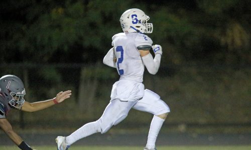 Stoneham’s late burst, ground game spark 49-21 win at Arlington