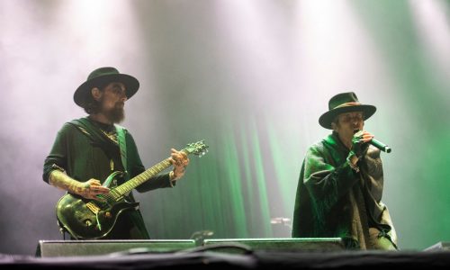 Perry Farrell is getting medical care after Jane’s Addiction concert brawl, wife says