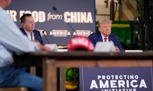 Trump listens during a farming event in rural Pennsylvania, then threatens John Deere with tariffs