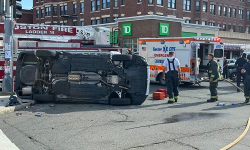 Vehicle flips on Comm. Ave. in Allston, Boston EMS transports 2 people to the hospital