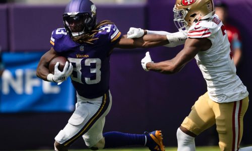 Forget the Lambeau Leap. Vikings running back Aaron Jones has the Bank Vault.