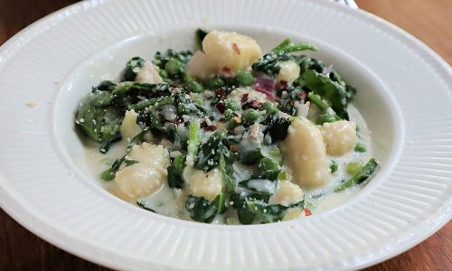 Gluten-free gnocchi with lemon, peas and spinach goes down easy