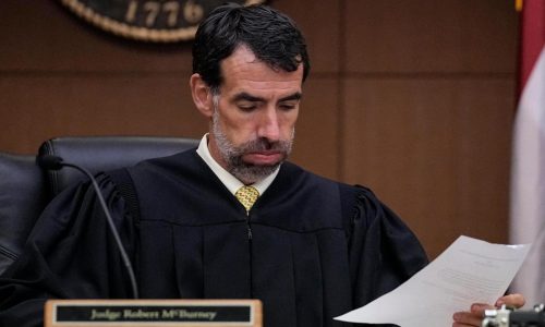 Georgia judge blocks ballot counting rule and says county officials must certify election results