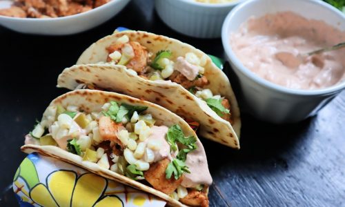 Fish tacos with fresh corn salsa get kick from chipotle crema