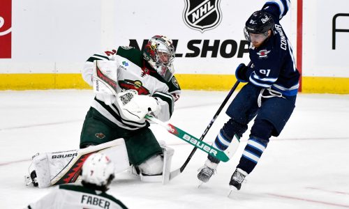 Shorthanded Wild earn another point in 2-1 OT loss at Winnipeg