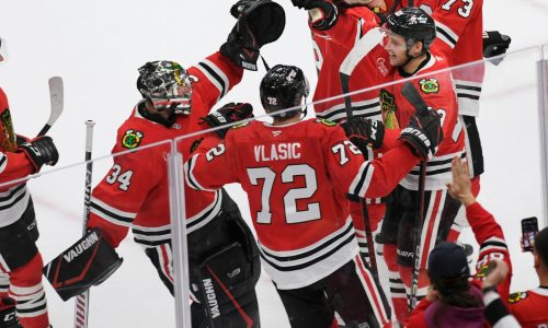 Wild rally for point, but Chicago snaps 12-game losing streak against Central rival