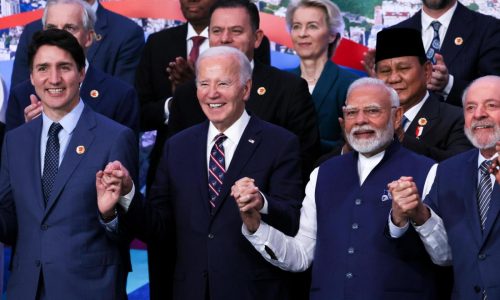 Biden appeals to world leaders to stay in the climate fight as Trump shadows his efforts
