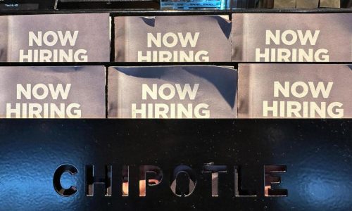 US applications for jobless benefits fall to 213,000, remaining near 7-month lows