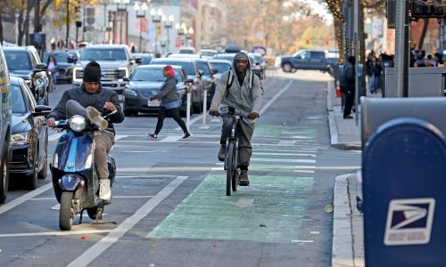 Boston is spending millions on bike lanes amid a budget crunch. Some wonder if the investment is worth it.