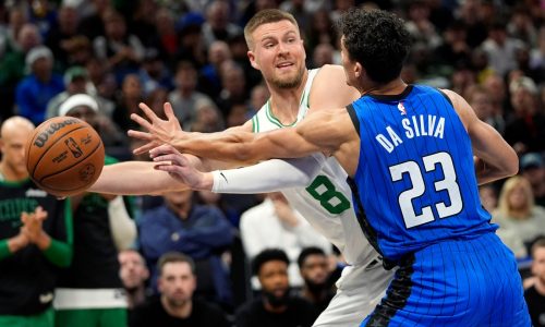 Kristaps Porzingis exits Celtics-76ers Christmas game with ankle injury