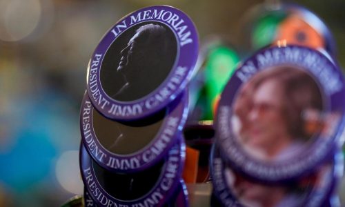 Jimmy Carter is being mourned in his tiny hometown and around the world