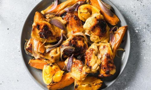 Roasted orange delivers big flavor in this smoky chicken traybake